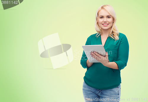 Image of smiling woman with tablet pc computer