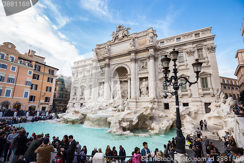 Image of Tourists visiting the Trevi Fountain, Rome, Italy.