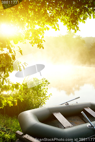 Image of Boat on river bank