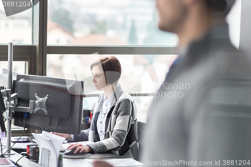 Image of Personal assistant working in corporate office.