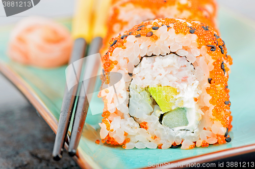 Image of California maki sushi with masago and ginger