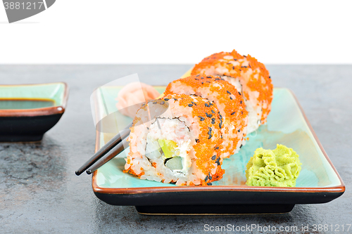 Image of California maki sushi with masago and ginger