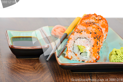 Image of California maki sushi with masago and ginger