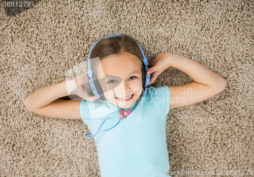 Image of Girl listen music