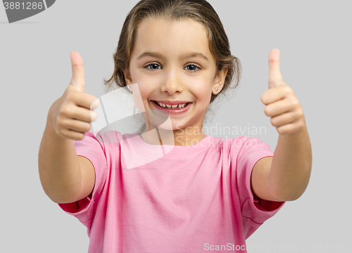 Image of Happy girl with thumbs up