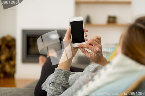 Image of Woman texting