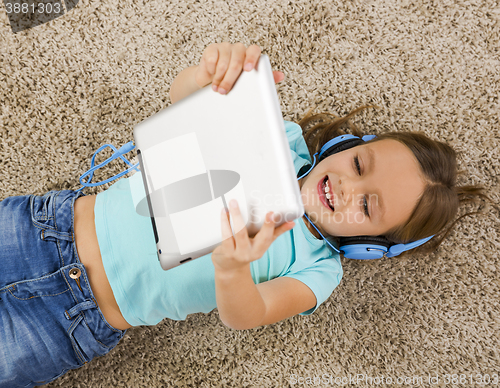 Image of Girl listen music
