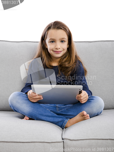 Image of Little girl with a tablet