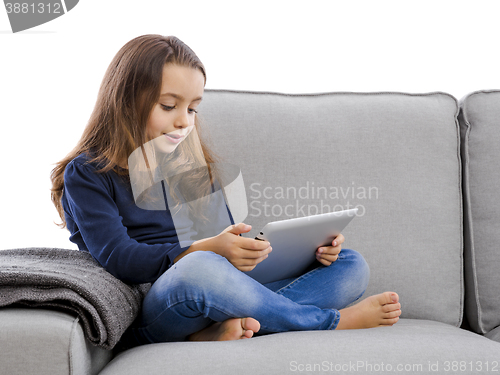 Image of Little girl with a tablet