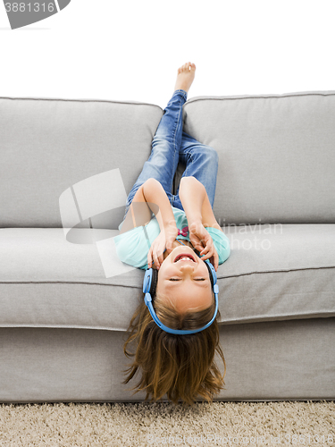 Image of Cute girl listen music