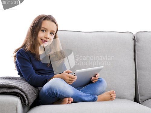 Image of Little girl with a tablet