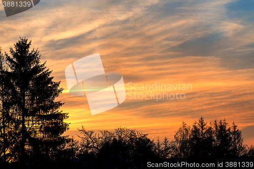 Image of sunset with orange sky and clouds