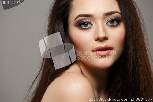 Image of Portrait close up of young beautiful woman in studio