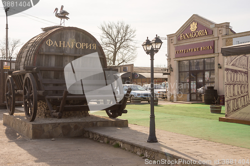 Image of Sennoy, Russia - March 15, 2016: A view of the company store \"Fanagoria\" and wine barrel next to it, in the village of Sennoy Krasnodar Territory