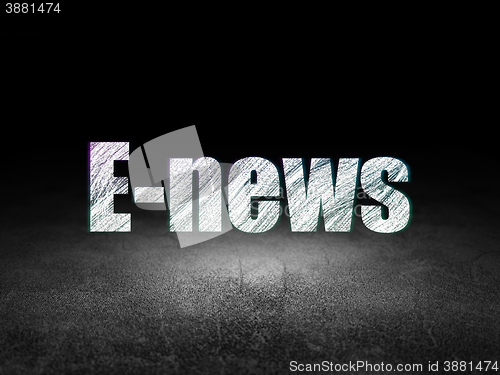 Image of News concept: E-news in grunge dark room
