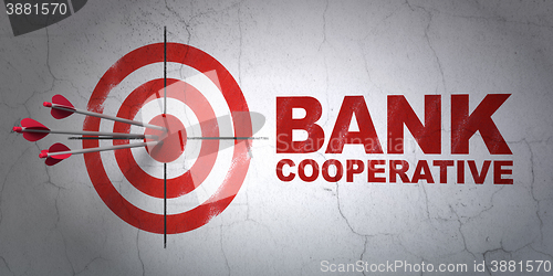 Image of Currency concept: target and Bank Cooperative on wall background