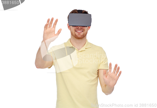 Image of happy man in virtual reality headset or 3d glasses