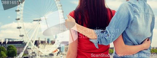 Image of close up of happy lesbian couple over ferry wheel