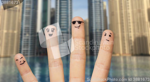 Image of close up of fingers with smiley faces