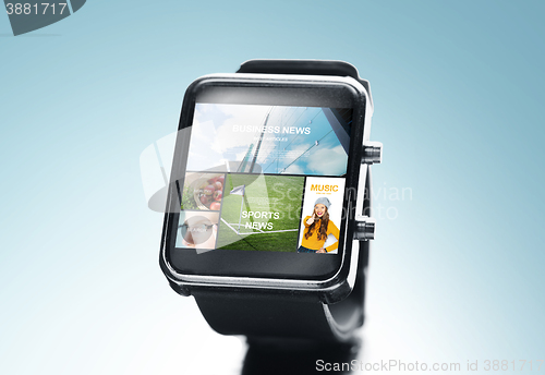 Image of close up of smart watch with news application