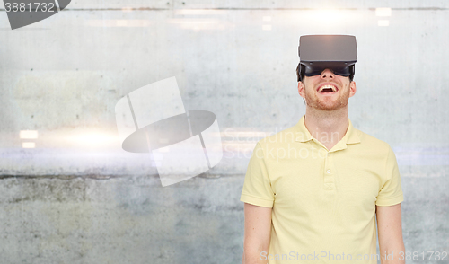 Image of happy man in virtual reality headset or 3d glasses