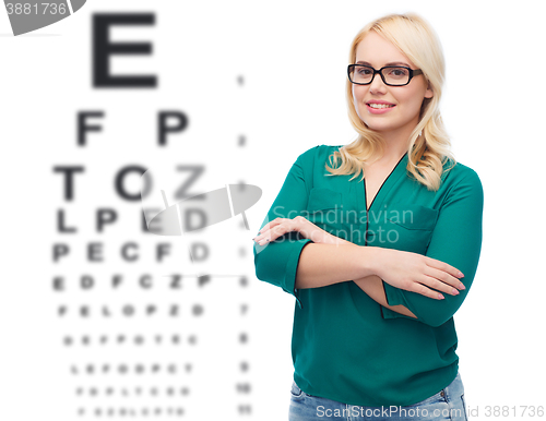 Image of smiling young woman with eyeglasses