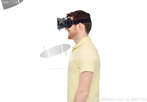 Image of happy man in virtual reality headset or 3d glasses