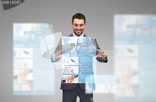 Image of businessman working with world news projection