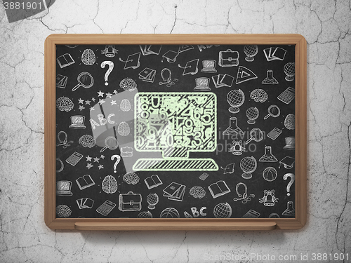Image of Learning concept: Computer Pc on School board background