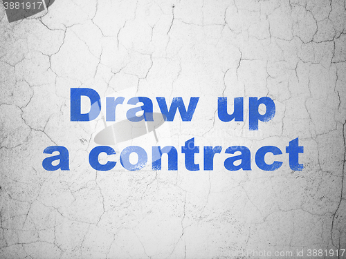 Image of Law concept: Draw up A contract on wall background