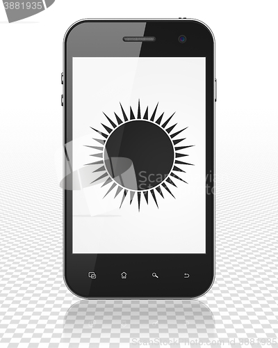 Image of Vacation concept: Smartphone with Sun on display