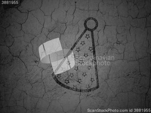Image of Holiday concept: Party Hat on grunge wall background