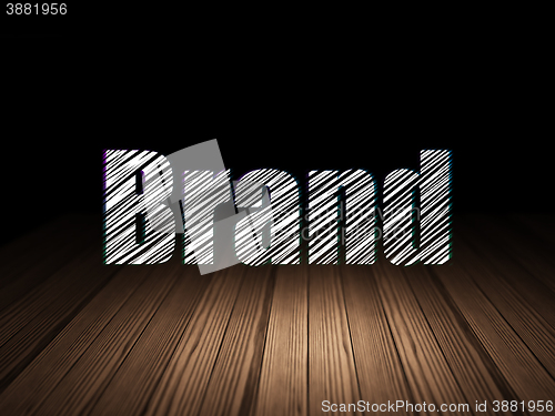 Image of Advertising concept: Brand in grunge dark room