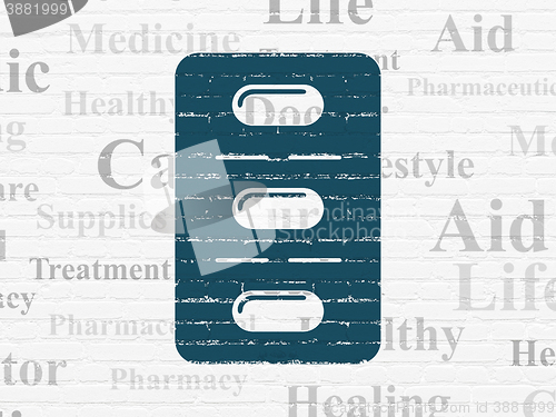 Image of Health concept: Pills Blister on wall background