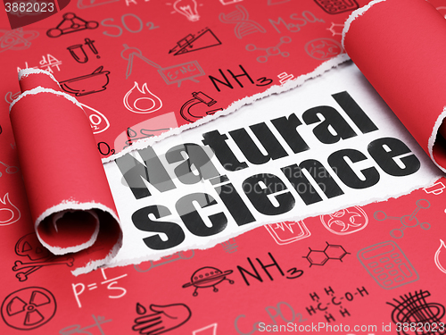 Image of Science concept: black text Natural Science under the piece of  torn paper