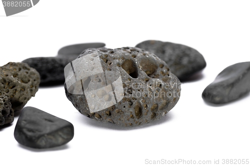 Image of Black strange rock isolated on white