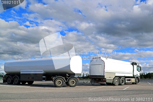 Image of White Tank Truck under Beautiful Sky