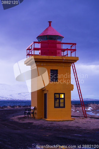 Image of Orange lighthouse in the evening, Iceland