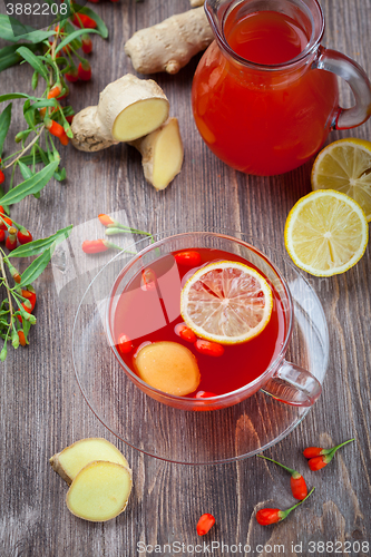 Image of Tea with fresh goji berries and ginger