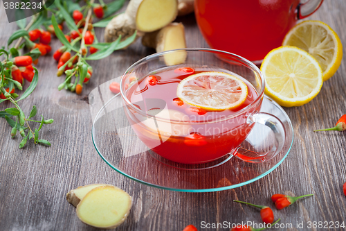 Image of Tea with fresh goji berries and ginger