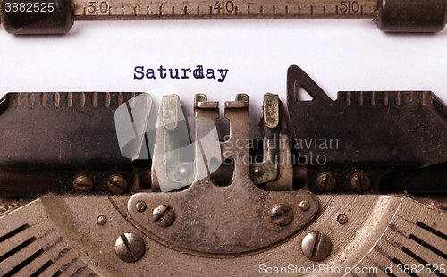 Image of Saturday typography on a vintage typewriter