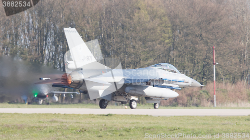 Image of LEEUWARDEN, NETHERLANDS - APRIL 11, 2016: A dutch F-16 on the gr