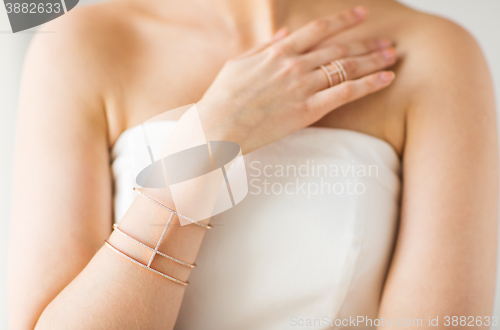 Image of close up of beautiful woman with ring and bracelet