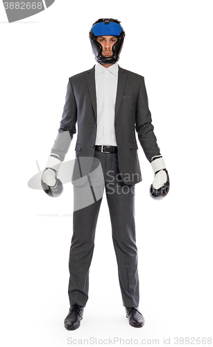 Image of Businessman in boxing gloves 