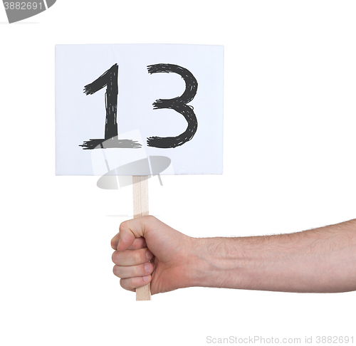 Image of Sign with a number, 13