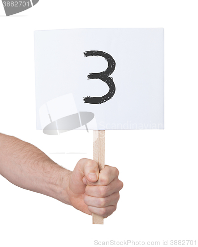 Image of Sign with a number, 3