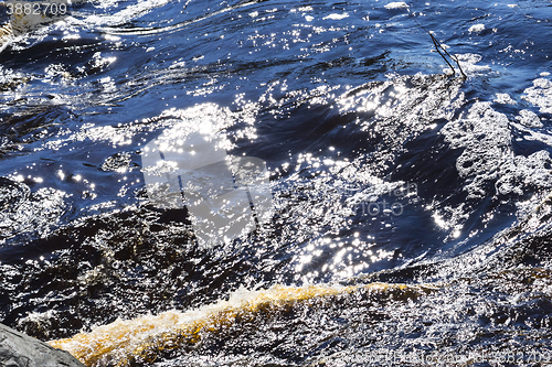 Image of River water sparkles in the sun