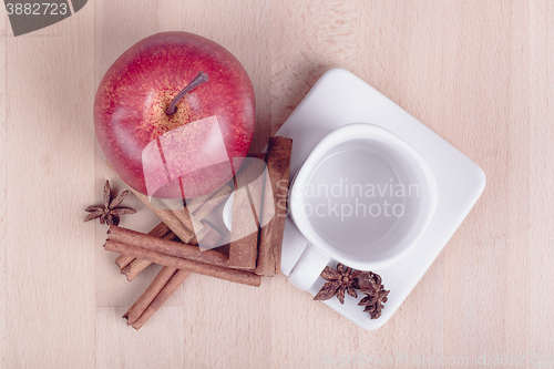 Image of apple cinnamon and empty cup