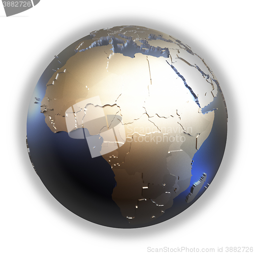 Image of Africa on golden metallic Earth