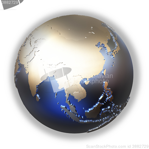 Image of Southeast Asia on golden metallic Earth